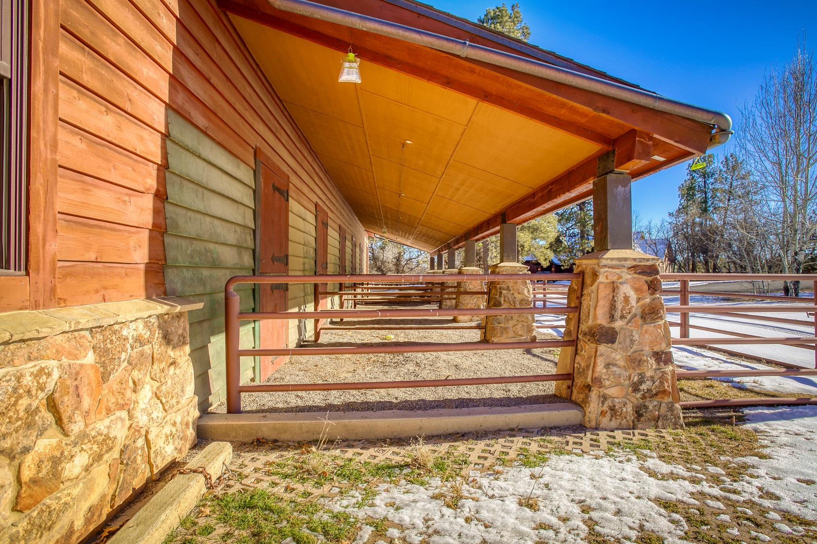 Barn exterior with indoor outdoor stalls