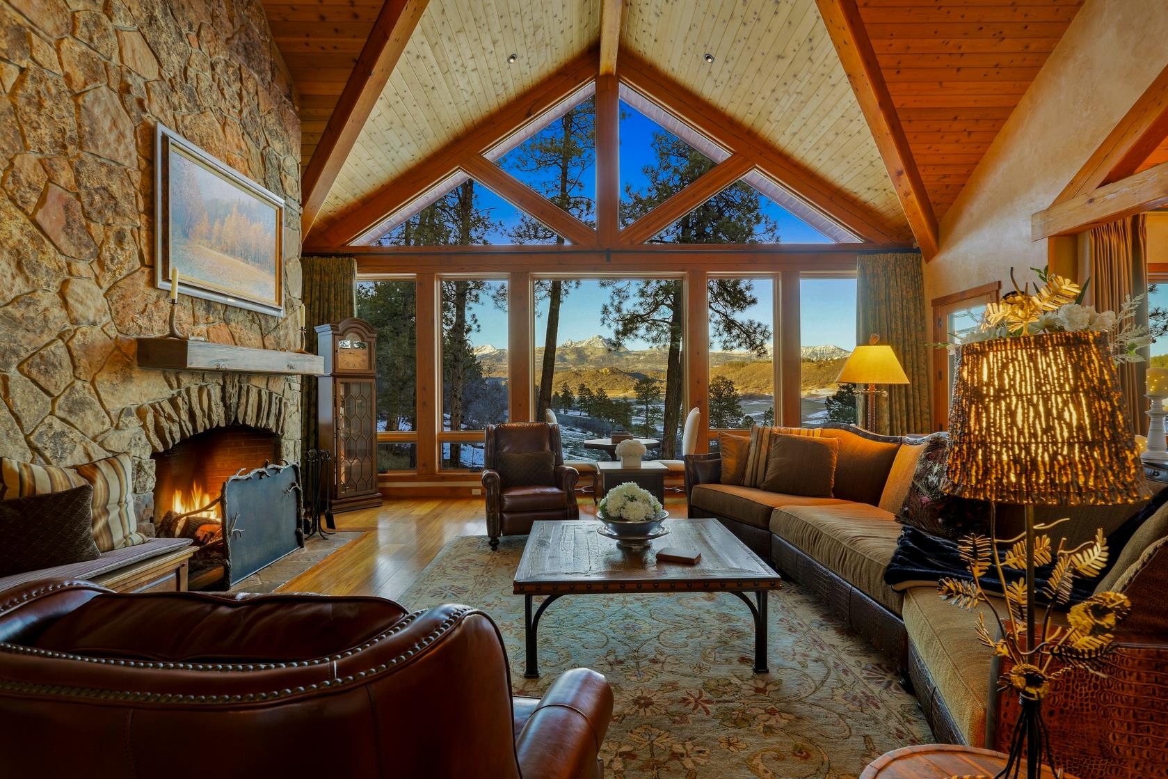 Great room with fireplace and mountain view